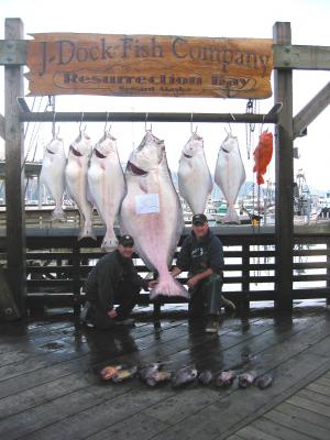 Scott with Captain James and his 272 lb halibut